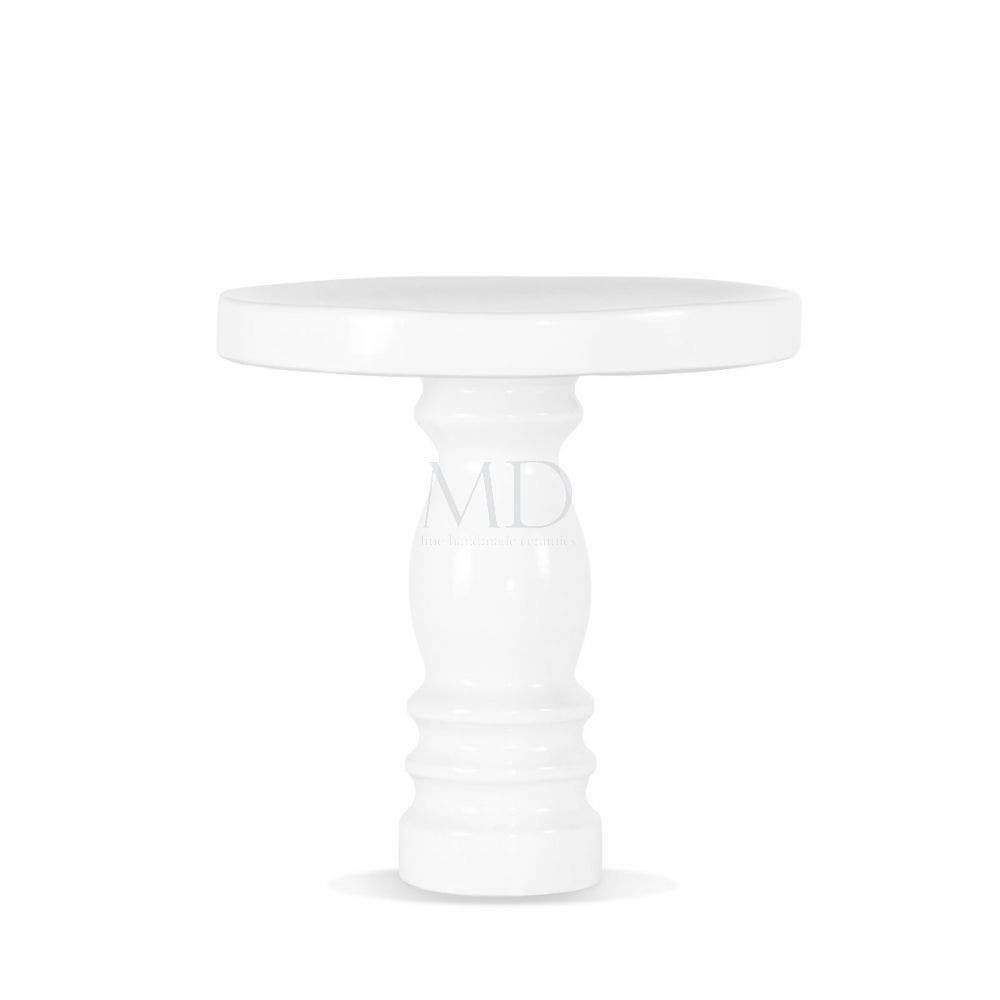 Elegant Cake Stand by Montes Doggett is entirely handmade hand fired ceramic, and dishwasher safe.