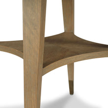 Load image into Gallery viewer, Carlton dining table square top is fitted with hinged leaves that create a round table when the leaves are implemented.
