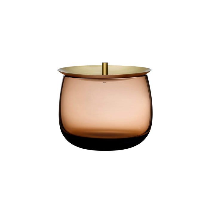 A nod to France’s famous headgear, this NUDE Beret storage box comprises a small crystalline glass container and a silky-looking brass lid. 
