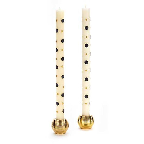 Black & Gold Dot Dinner Candles. They feature a fun and fresh hand-painted pattern of polka dots that add the glowing touch of MacKenzie-Childs to your dining table.